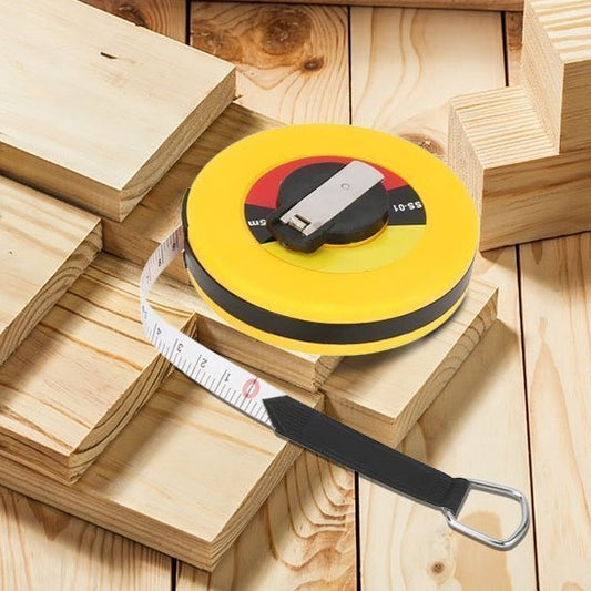 Mètre ruban professionnel jaune et noir pour mesures de précision en menuiserie